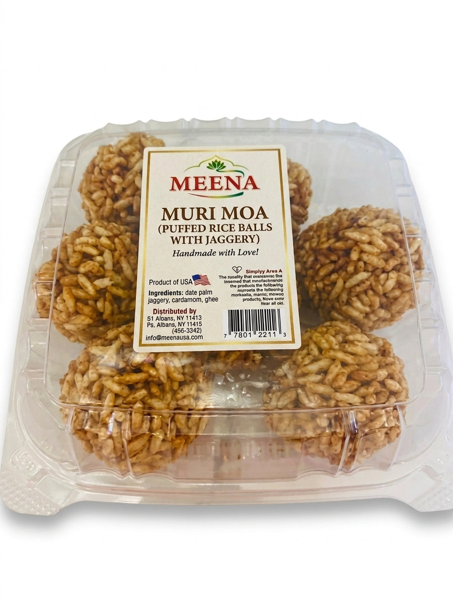 A clear plastic clamshell container holding several round, golden-brown rice balls with jaggery, with a white and red Meena brand label on the front.