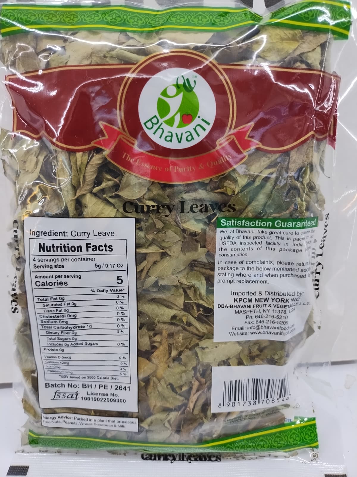 A bag of Bhavani brand dried curry leaves, showing the front packaging with the brand logo and a side label displaying the nutrition facts and ingredients.