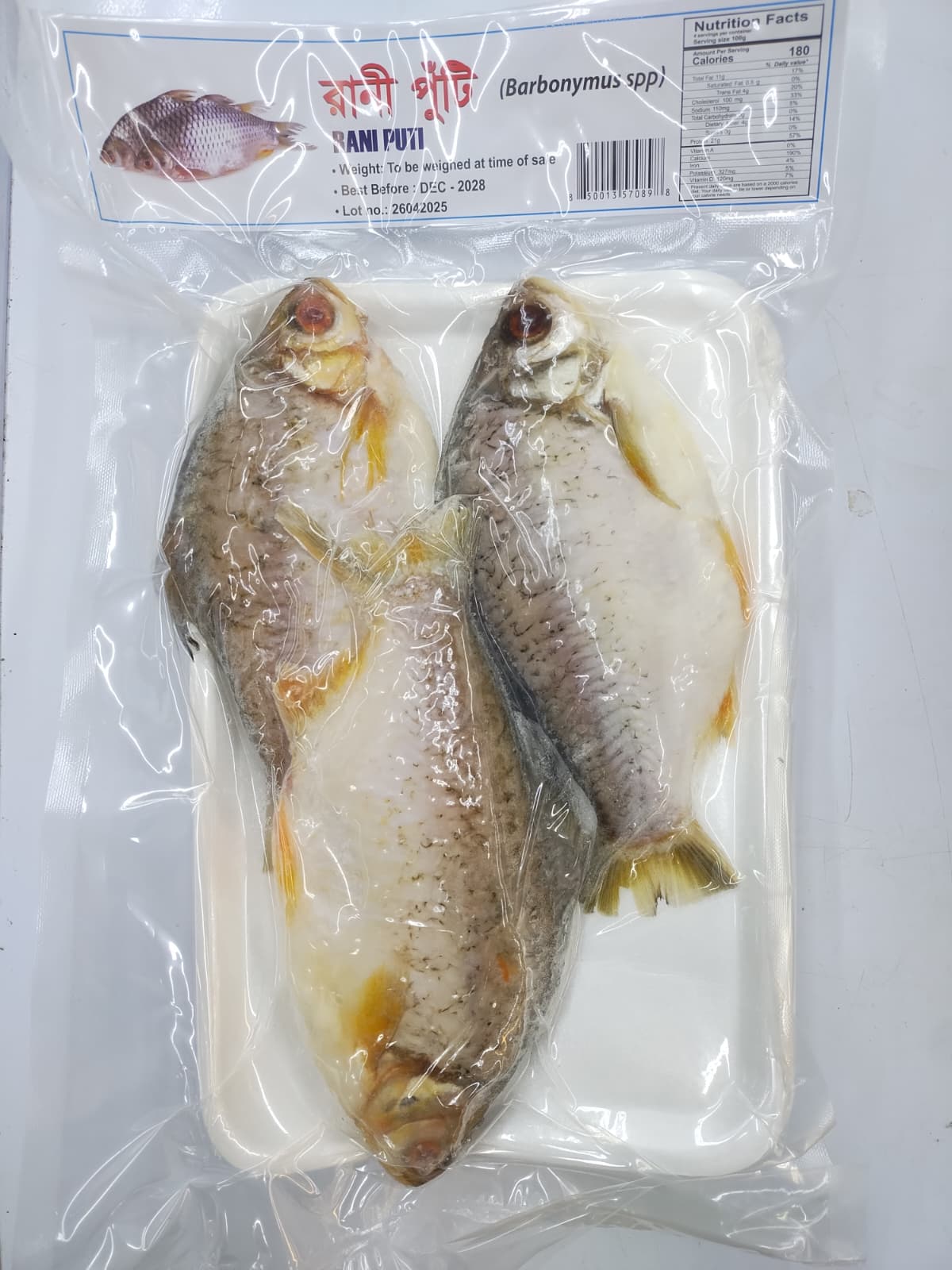 Three packaged fish in a clear plastic wrap on a white background