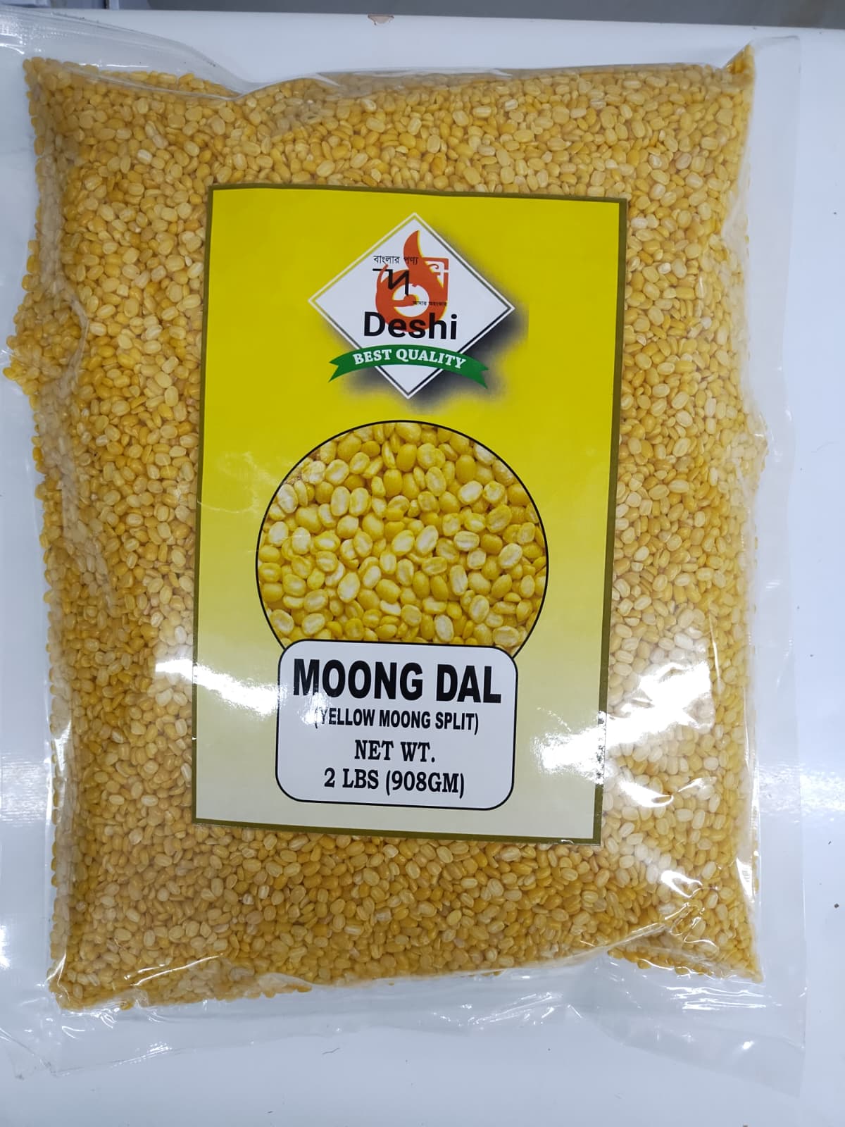 Packaged yellow moong dal with Deshi brand label on a white background