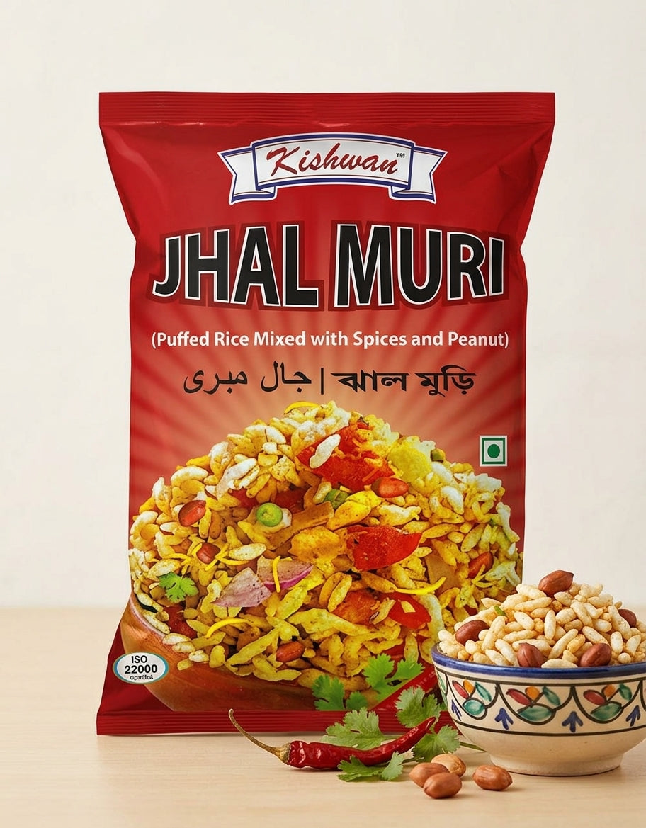 A red bag of Kishwan Jhal Muri puffed rice mixed with spices and peanut, displayed on a light wooden surface with a small bowl of peanuts and red chilies in front.