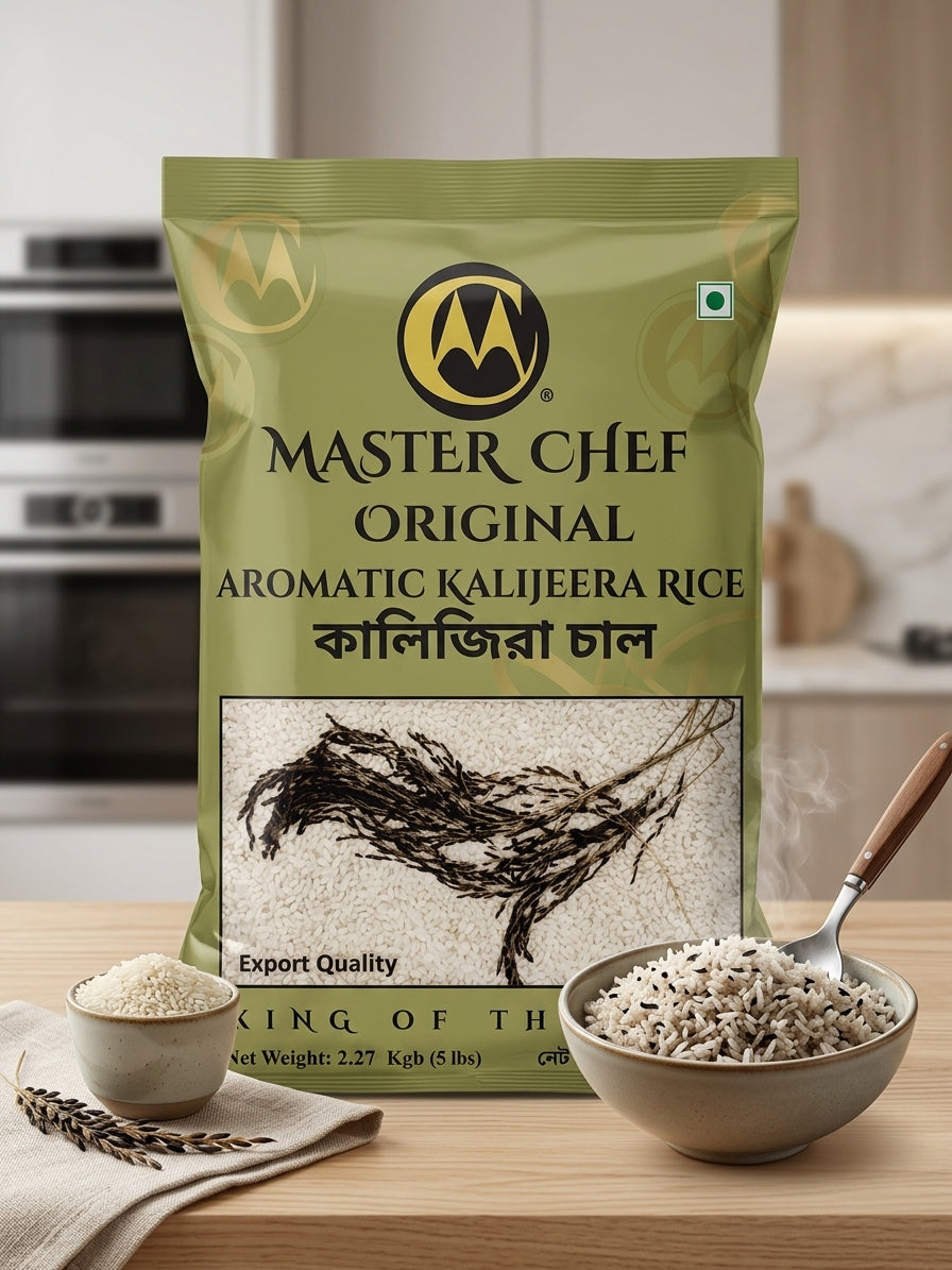 A bag of Master Chef Original Aromatic Kaligeera Rice stands on a wooden countertop in a kitchen setting, with a bowl of cooked rice and a small dish of raw rice beside it.