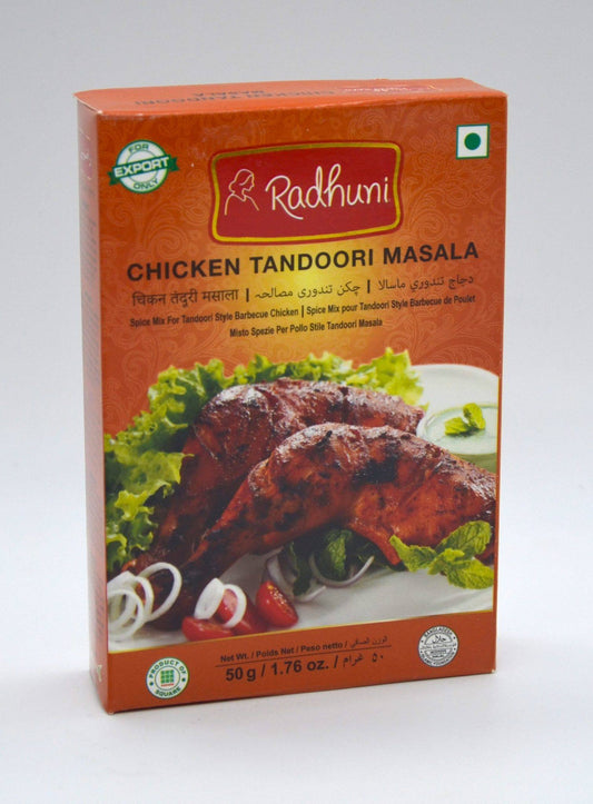 Box of Radhuni Chicken Tandoori Masala with images of roasted chicken and vegetables on a white background