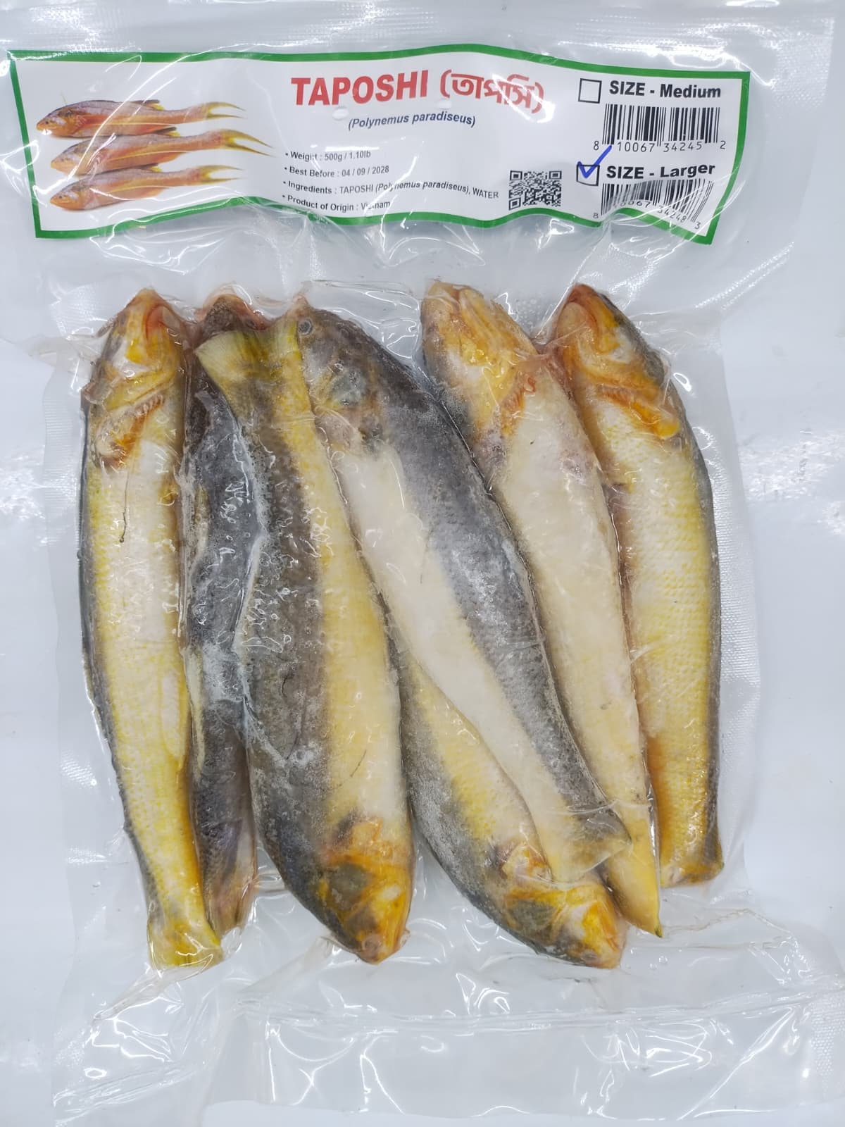 A vacuum-sealed plastic bag containing several whole fish, with a green and white header label at the top that reads TAPOSHI and includes a barcode.