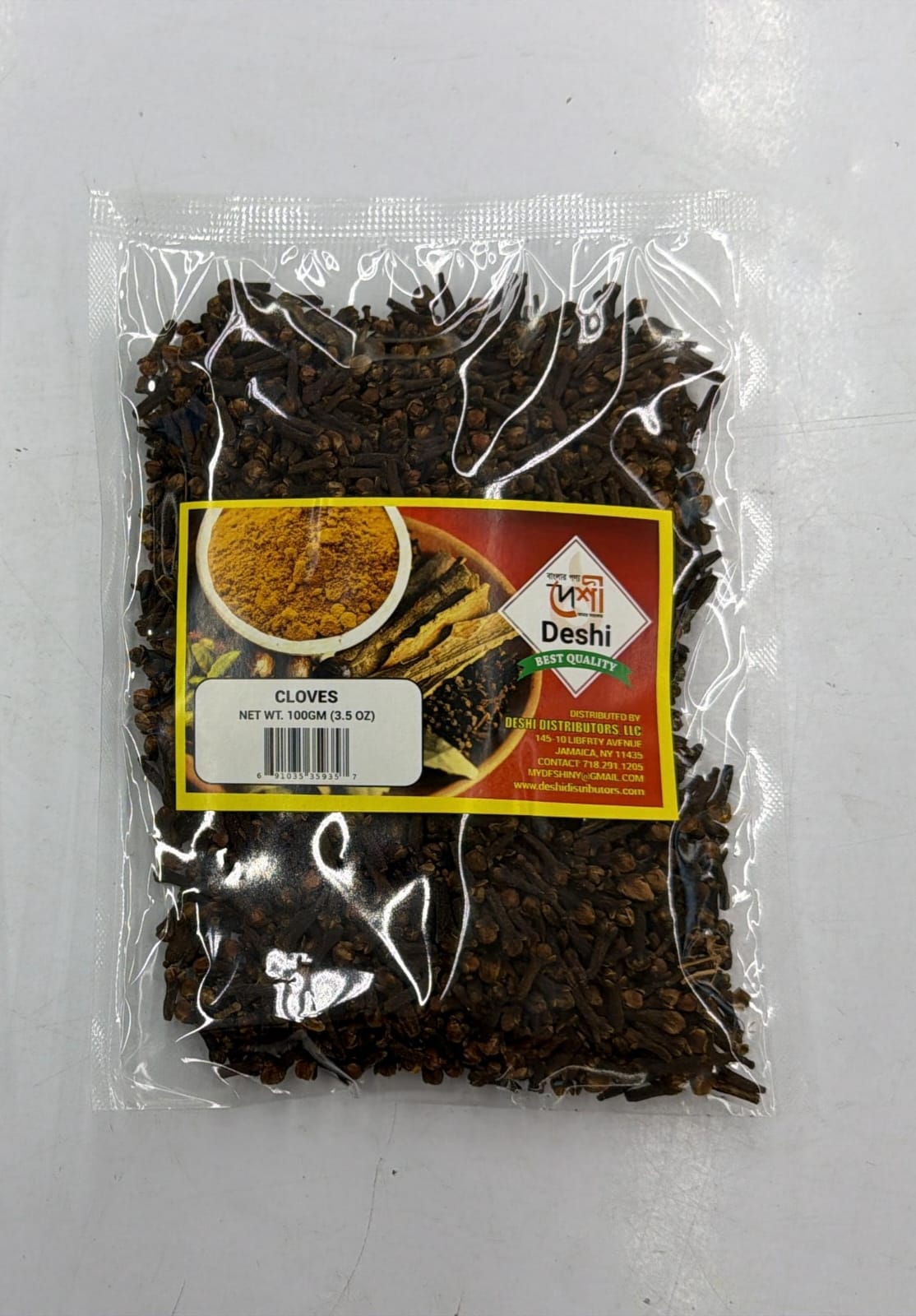 Packaged cloves with a Deshi brand label on a white background