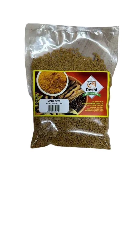 A clear plastic bag of Dishi Organic Methy Seeds, showing the brown seeds inside, with a yellow and red label on a gray stone surface.