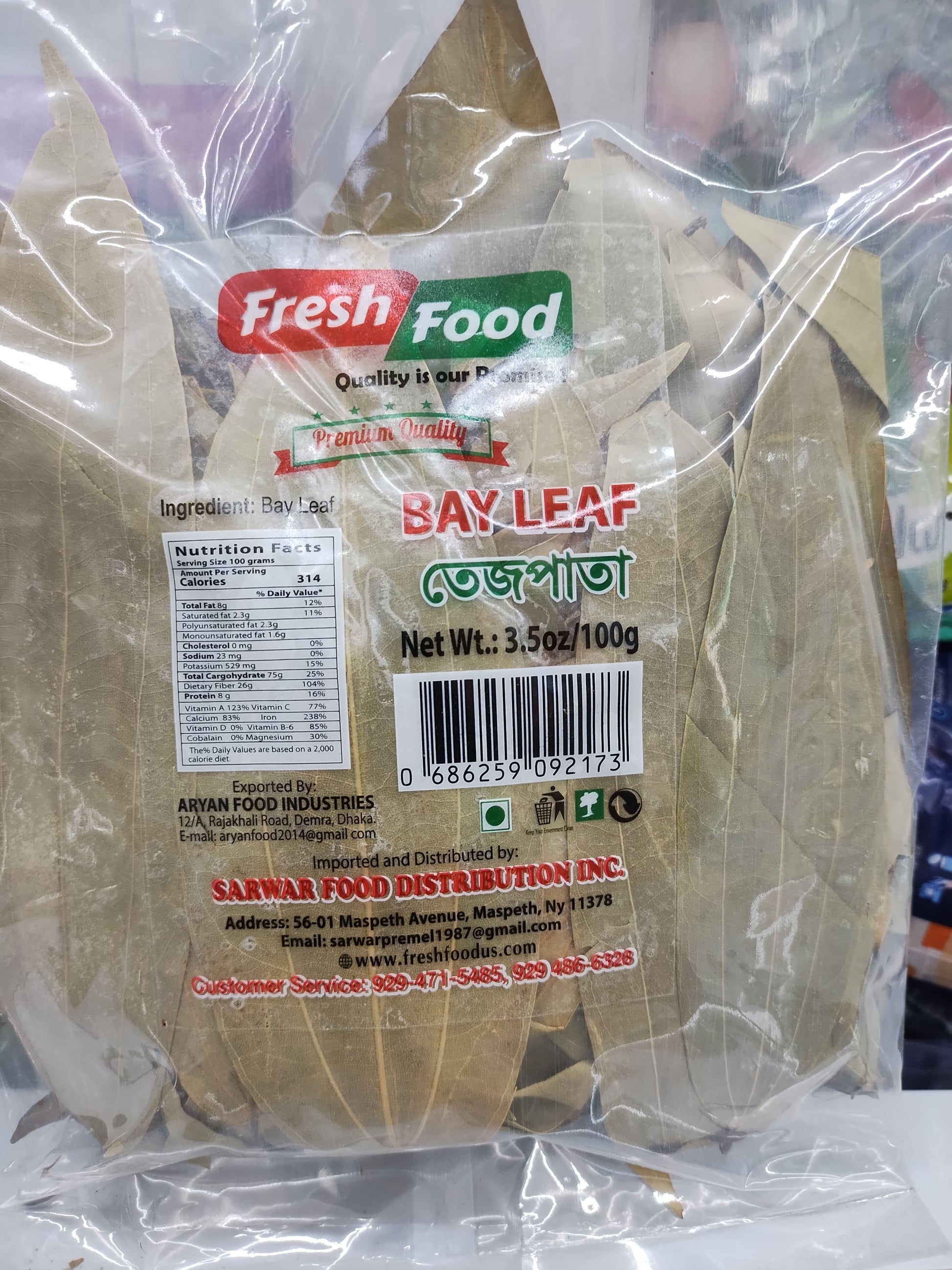 A clear plastic bag of Fresh Food brand Bay Leaf tea leaves, showing the natural green-brown leaves inside and printed labels including a barcode and product details.