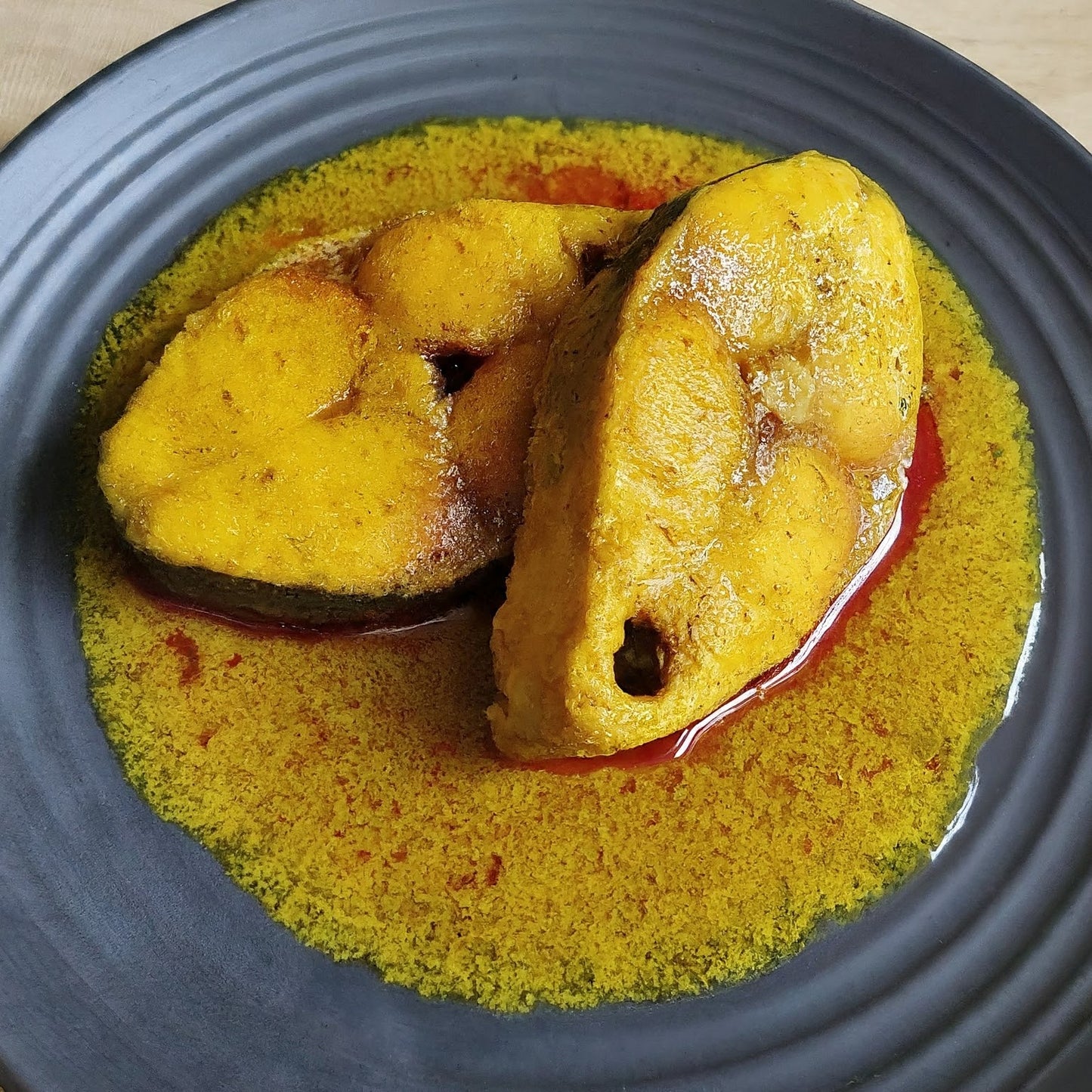 Shorshe Ilish (Hilsa fish cooked with mustard) (2 pc)