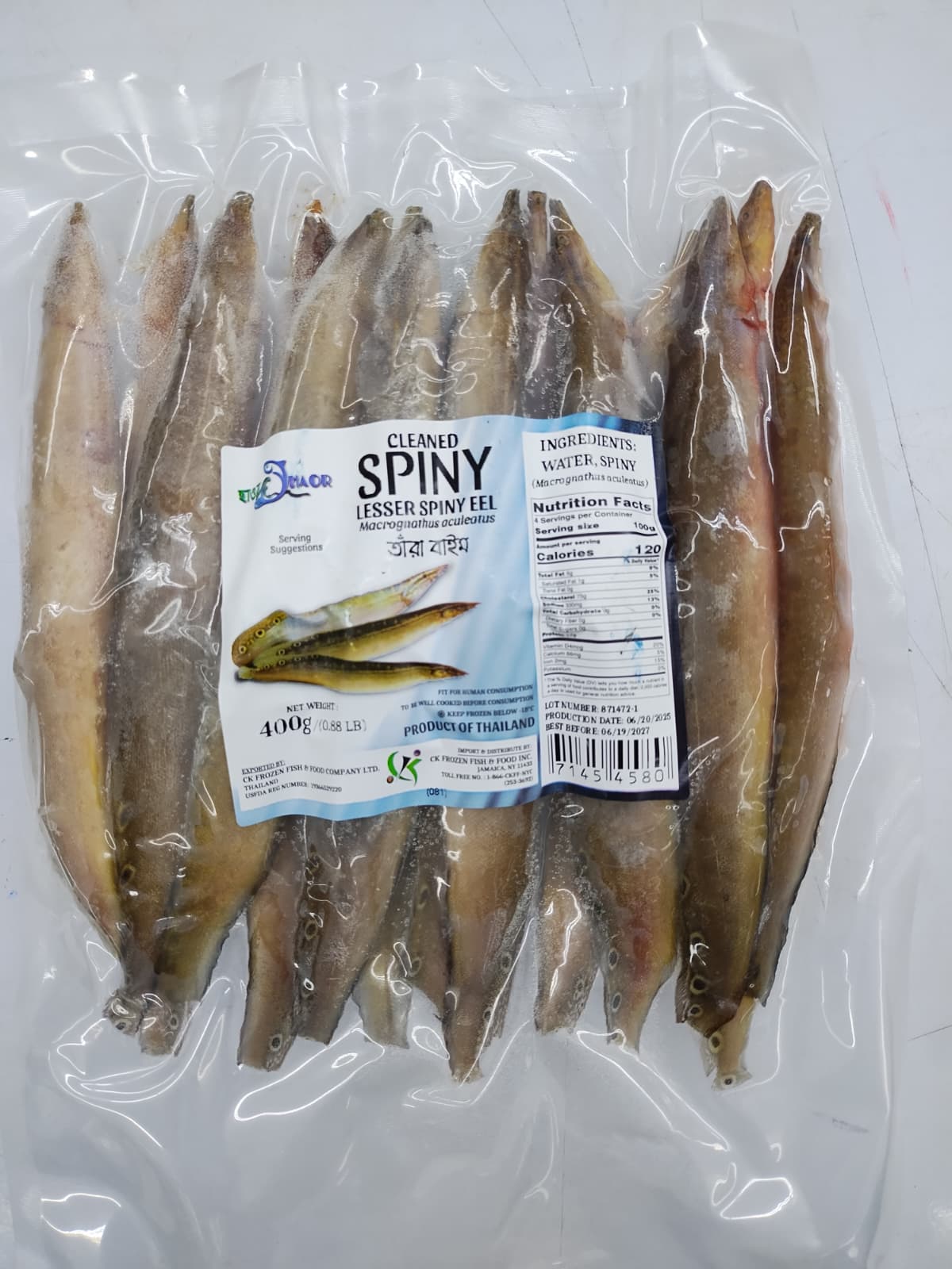 Packaged spiny fish with a label on a white background