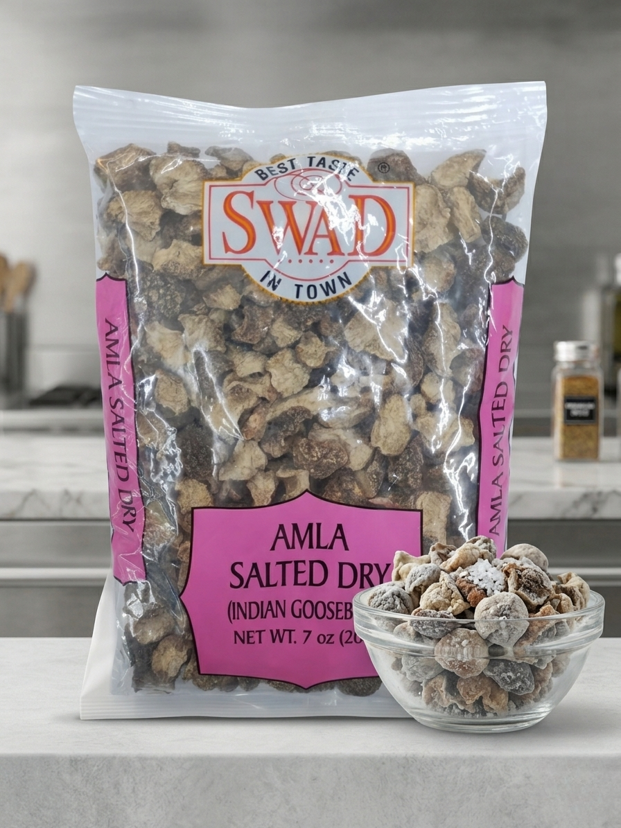 Bag of Swad Amla Salted Dry with a bowl of the product on a kitchen counter.
