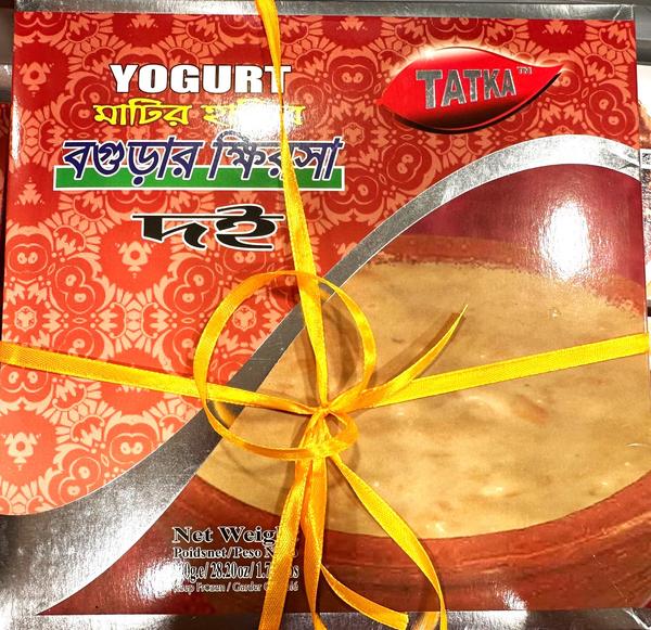 Yogurt package with red and yellow design, featuring the brand 'Tatka'.